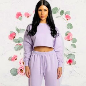 FILA CREW NECK CROPPED RAW HEM LONG SLEEVE SWEATSHIRT IN LAVENDER LIGHT PURPLE L